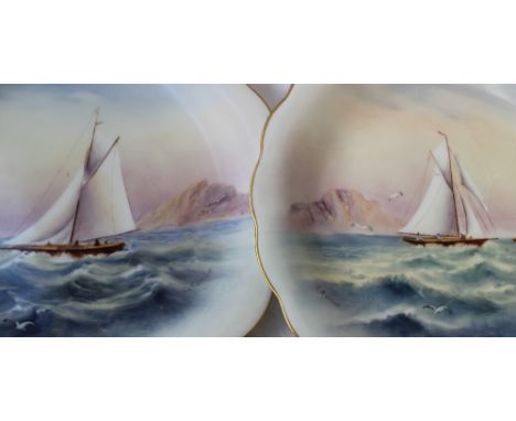 A pair of Royal Worcester porcelain plates of circular waved form, each painted with Yachts off a rocky headland and gilt, by