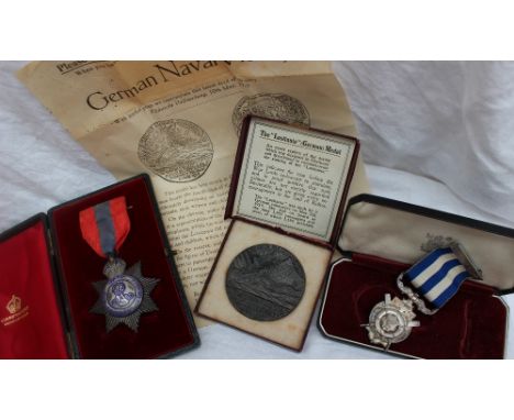 An Edward VII white metal on copper imperial service medal with blue enamel decoration, issued to Francis Duncan, together wi