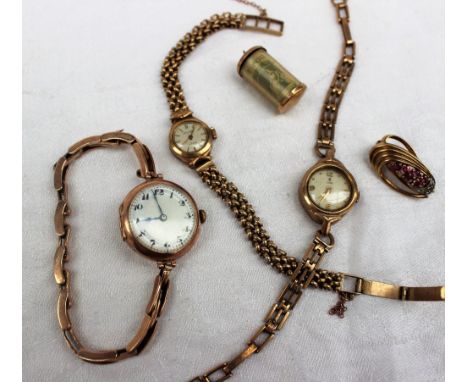 A Lady's 9ct yellow gold wristwatch, with a circular enamel dial and Arabic numerals, on an expanding bracelet strap together