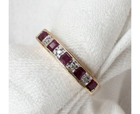 A ruby and diamond half eternity ring set with five princess cut rubies and four round brilliant cut diamonds to a in 9ct yel