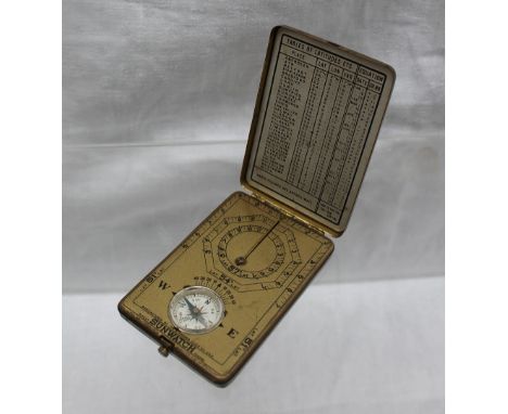 An Ansonia Clock Co Sunwatch pocket sundial and compass, in a brass case, 7.5cm long