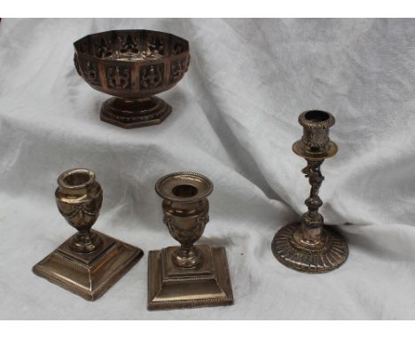 A pair of late Victorian silver desk candlesticks, with swag and leaf decoration to a stepped square base, London, 1890, Fave