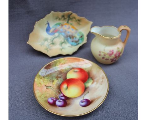 A Royal Worcester porcelain miniature jug, transfer and infil decorated with garden flowers, green printed mark together with