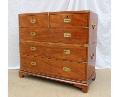 A 19th century mahogany chest of drawers converted into a two section campaign chest with brass carrying handles, the rectang