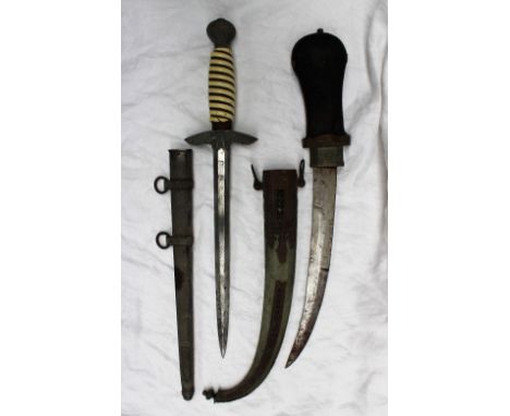 A World War II German Luftwaffe dagger with a cream celluloid grip with wire binding the pommel with swastika and oak leaf wr
