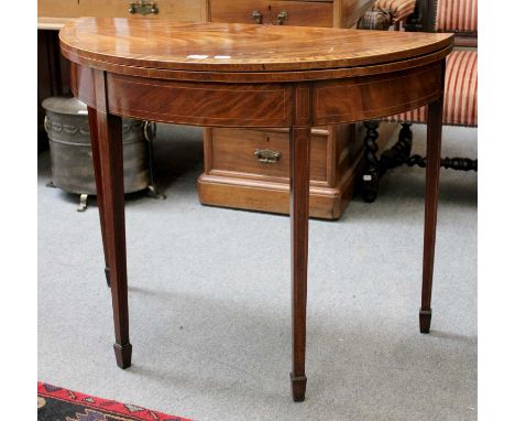 A George III Mahogany Demi Lune Fold Over Card Table, 90cm by 45cm by 73cm 