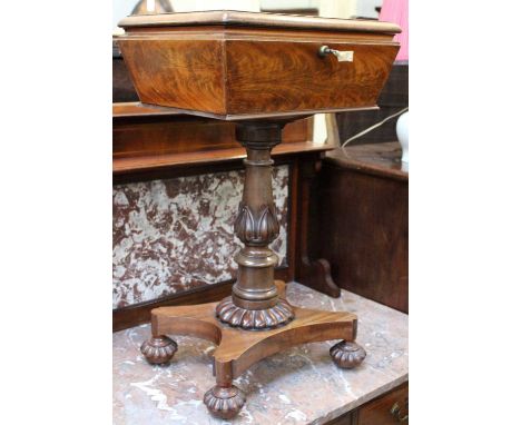 A Mahogany Teapoy, by Gillows of Lancaster, with a rectangular lifting top enclosing a sectioned interior and glass mixing bo