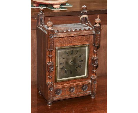 A German Oak Quarter Striking Table Clock, circa 1900, retailed by Thos Armstrong &amp; Co, Manchester, 44 cm highMovement no