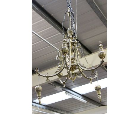 A French Brass Five Light Hanging Electrolier, each scrolling branch surmounted by an eagle finial, 95cm drop (approximately)