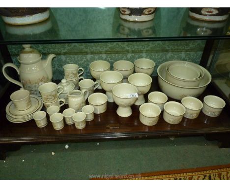A quantity of Royal Doulton 'Florinda' tableware including salad bowl 9 1/2", large souffle dish, medium souffle dish, six in