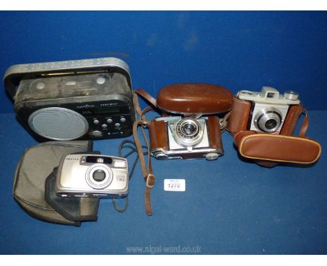 A cased Kodak 'Retinette' camera, Kodak 'Bantam' Coloursnap cased camera, Pentax Espio 738S and Matsui digital radio.