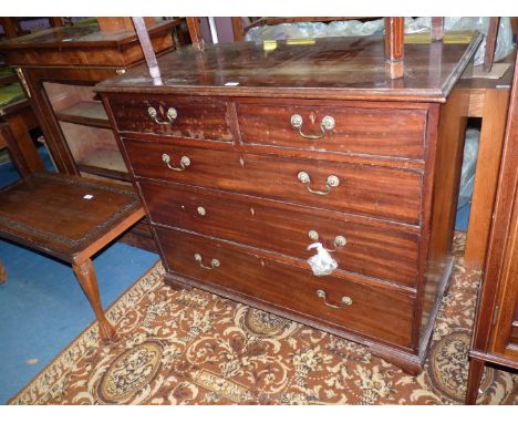 A 19th c. Mahogany Chest of three long and two short Drawers having brass swan neck handles and standing on ogee bracket feet