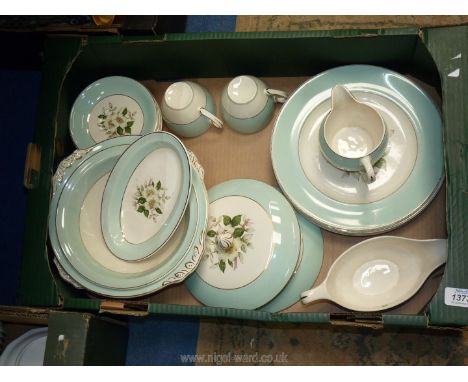 A Johnson Bros part dinner and breakfast service including dinner plates, lidded tureens, saucers, cups, jug, gravy boat and 