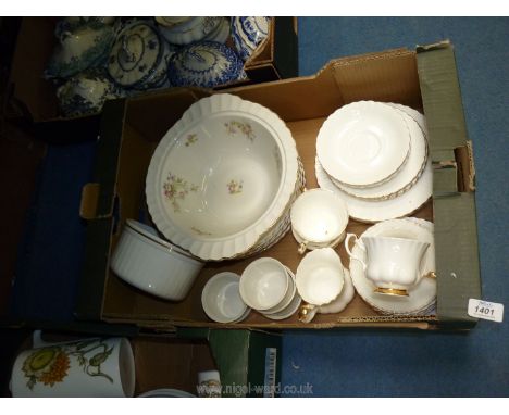 A quantity of Royal Albert white and gold china tea and dinner ware including cups, saucers, side  and dinner plates, Royal W
