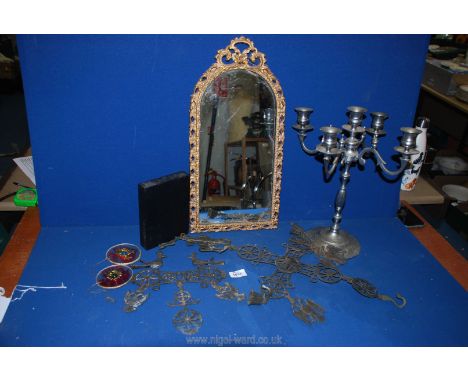 A quantity of miscellanea including metal framed hall mirror, possibly Russian icon wall hangings, white metal candelabra (a/