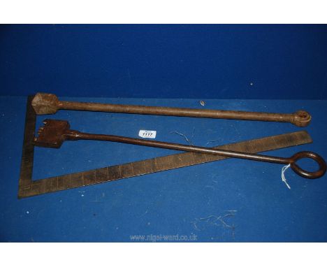 Three antique wrought iron Tools comprising blacksmith's square branding iron and large turn key. 