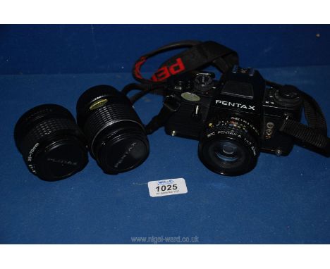 *A Pentax ILX 35 mm SLR camera with SMC Pentax - A f/1: 1.7  50 mm lens, a 35-70 mm SMC Pentax - A f/1: 3.5-4.5 lens and a 12