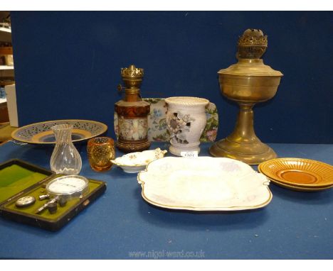 A quantity of miscellanea including brass oil lamp base, night light, Royal Crown Derby pin dish, small amber glass vase, Can