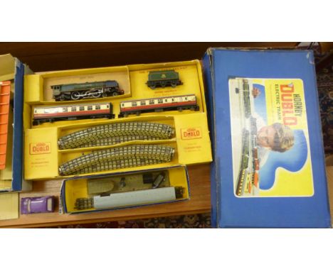 A Hornby Dublo model electric train set, comprising The Duchess of Montrose with a tender, two passenger carriages and track 