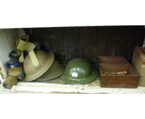 Military related collectables: to include three WWII tin hats; a brass gun sight  stamped OS322GA No.41 MKIIs  15''L; and spe