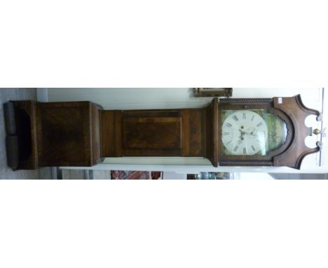 An early 19thC figured, crossbanded and satinwood string inlaid mahogany longcase clock, the hood having a swan neck pediment