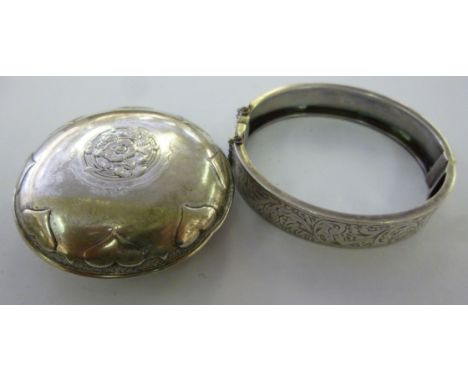 A silver bracelet, having foliate ornament  Chester 1952; and a white metal Art Nouveau inspired trinket box, decorated with 