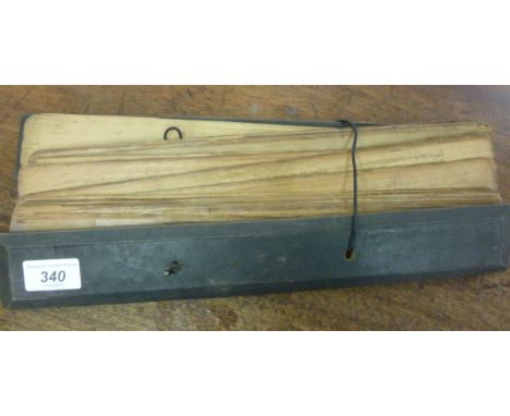 An early 20thC Asian manuscript, inscribed on multiple slivers of wood, between stained hardwood borders  14''w        OS3