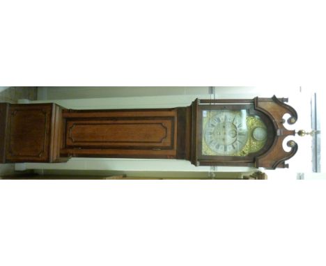 A George III oak and crossbanded mahogany longcase clock, the hood having a swan neck pediment, over fluted and turned column