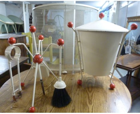 A 1950s cream painted steel fireside companion with spherical red plastic finials with a matching coal bucket and liner; and 