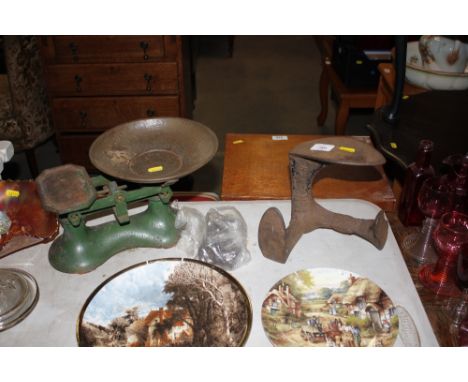 A shoe last and a set of scales and weights