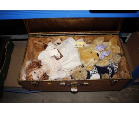 A storage trunk and contents of dolls and soft toys