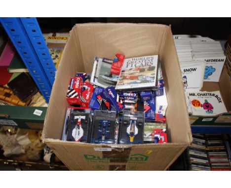 A box of various boxed Corgi model F1 cars etc.