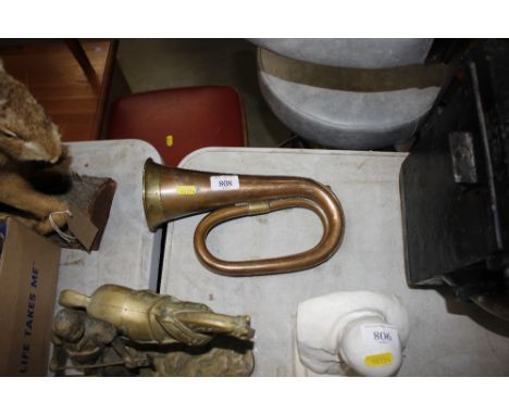 A brass and copper bugle