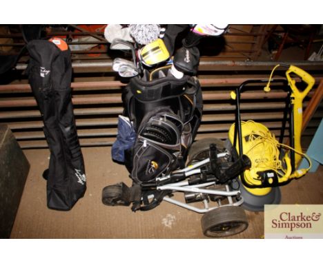 A quantity of good quality golf clubs in Power Caddy bag and trolley