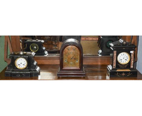 A German mahogany cased eight day striking mantel clock housing a three train movement; together with two 19th century slate 