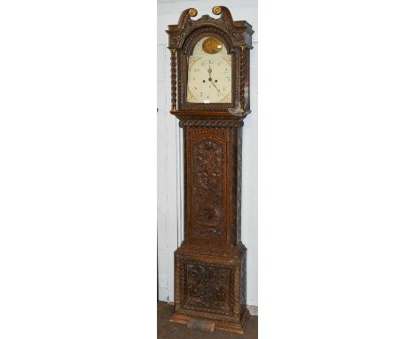 A carved oak eight-day longcase clock, 13'' arch painted dial, (later case)Condition report: With pendulum and two weights