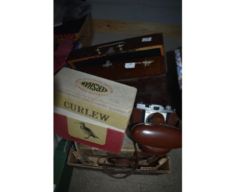 A vintage Lion Menucator, No 2 model, a vintage Kodak coloursnap 35 camera and a Kershaw eight-twenty Curlew II camera.