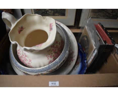 An antique wash basin and jug having floral pattern, a Victorian basin, a planter and two books, 'Castles' by C.Oman and 'abb