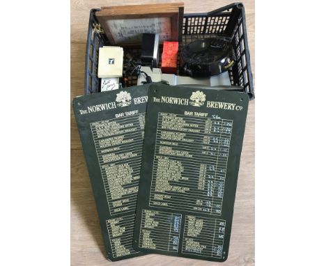 A collection of brewery items . To include a modern Guinness pump, enamelled Norwich Brewery Co signs, a boxed double set of 