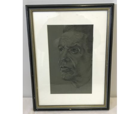 A framed and glazed pastel monochrome portrait.  