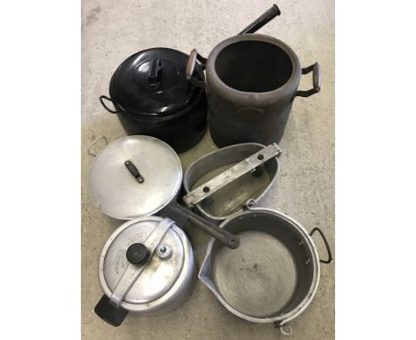 A collection of vintage cooking pots and pans. To include preserve pan, pressure cookers and large lidded enamel saucepan. 