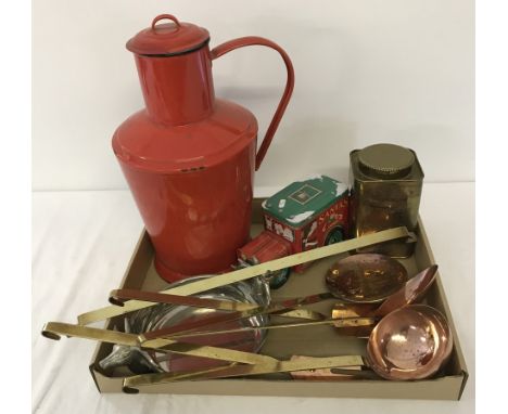 A collection of assorted metalware items. To include large red enamel lidded jug, brass English Breakfast Tea canister and a 