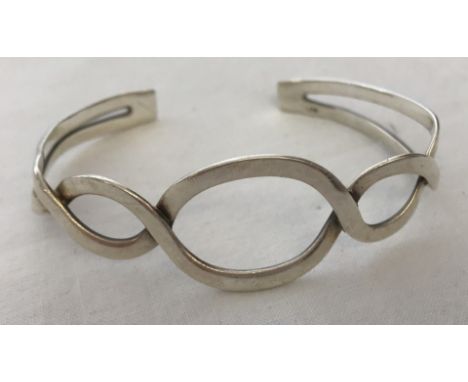 A 925 silver twist design bangle.  Total weight approx. 17g.