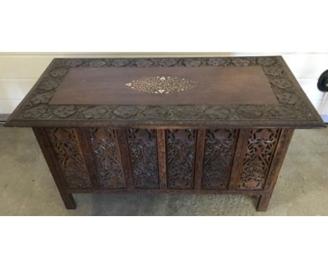 A vintage carved occasional table with inlaid detail to top. Rectangular shaped top with floral and leaf carved decoration. O