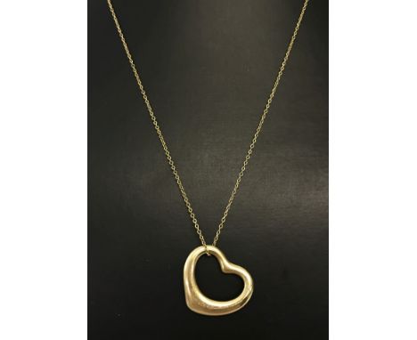 18ct yellow gold Tiffany necklace. Elsa Peretti open heart pendant with 16" chain. Original pouch and box. 