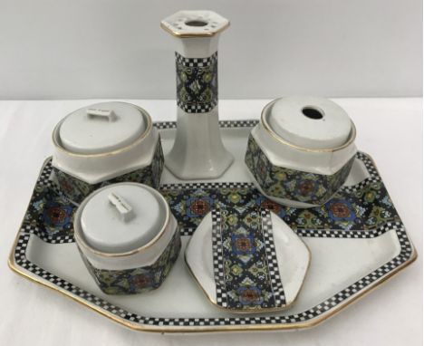 A vintage dressing table set with geometric design by H. K. Tunstall Comprising tray, 2 lidded pots (I lid a/f), a powder pot