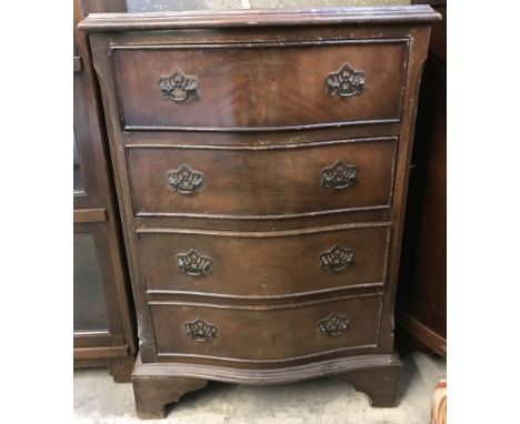 A small vintage serpentine fronted 4 drawer chest of drawers with drop down handles.  Approx. 51cm wide x 76cm tall.