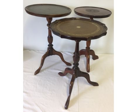 3 vintage tripod wine tables with turned pedestal bases. 2 with leather top inlay.  Tallest approx. 53cm tall.