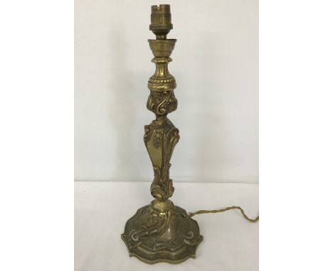 A vintage decorative brass table lamp base.  Approx. 37.5cm tall.