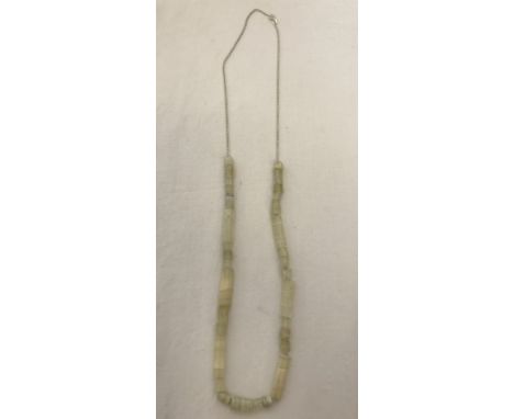 A 925 silver chain with white onyx beads.  Chain 30".